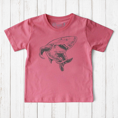 Kids' Shark Organic Cotton T-Shirt in coral pink with black shark design. Ocean-themed sustainable shirt for children by Uni-T.