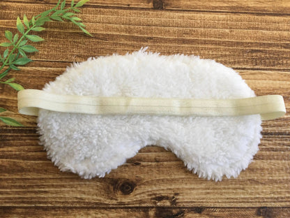 Back view of Sweet Dreams Sleep Mask showing plush cream minky fabric and soft elastic strap for comfort and secure fit. Enhances relaxation and sleep quality.