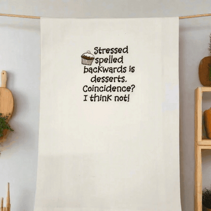 Stressed Desserts Towel - Embroidered | Absorbent & Fun hanging in a cozy kitchen setting, perfect humorous accent for home and garden linen collections.