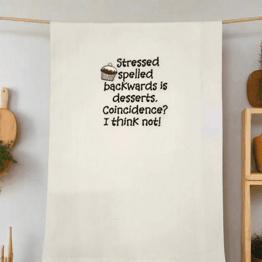Stressed Desserts Towel - Embroidered | Absorbent & Fun hanging in a cozy kitchen setting, perfect humorous accent for home and garden linen collections.