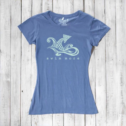 Women's swimming T-shirt in blue bamboo and organic cotton with 'Swim More' fish graphic. Eco-friendly beachwear top for swimmers by Uni-T.