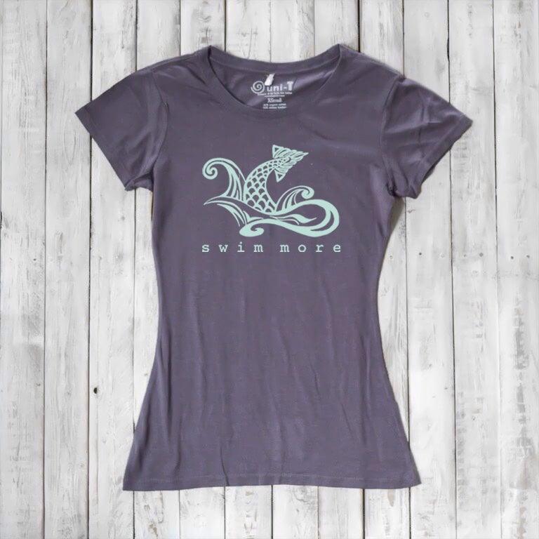Charcoal grey women's 'Swim More' T-shirt in bamboo and organic cotton. Eco-conscious graphic tee for ocean lovers by Uni-T.