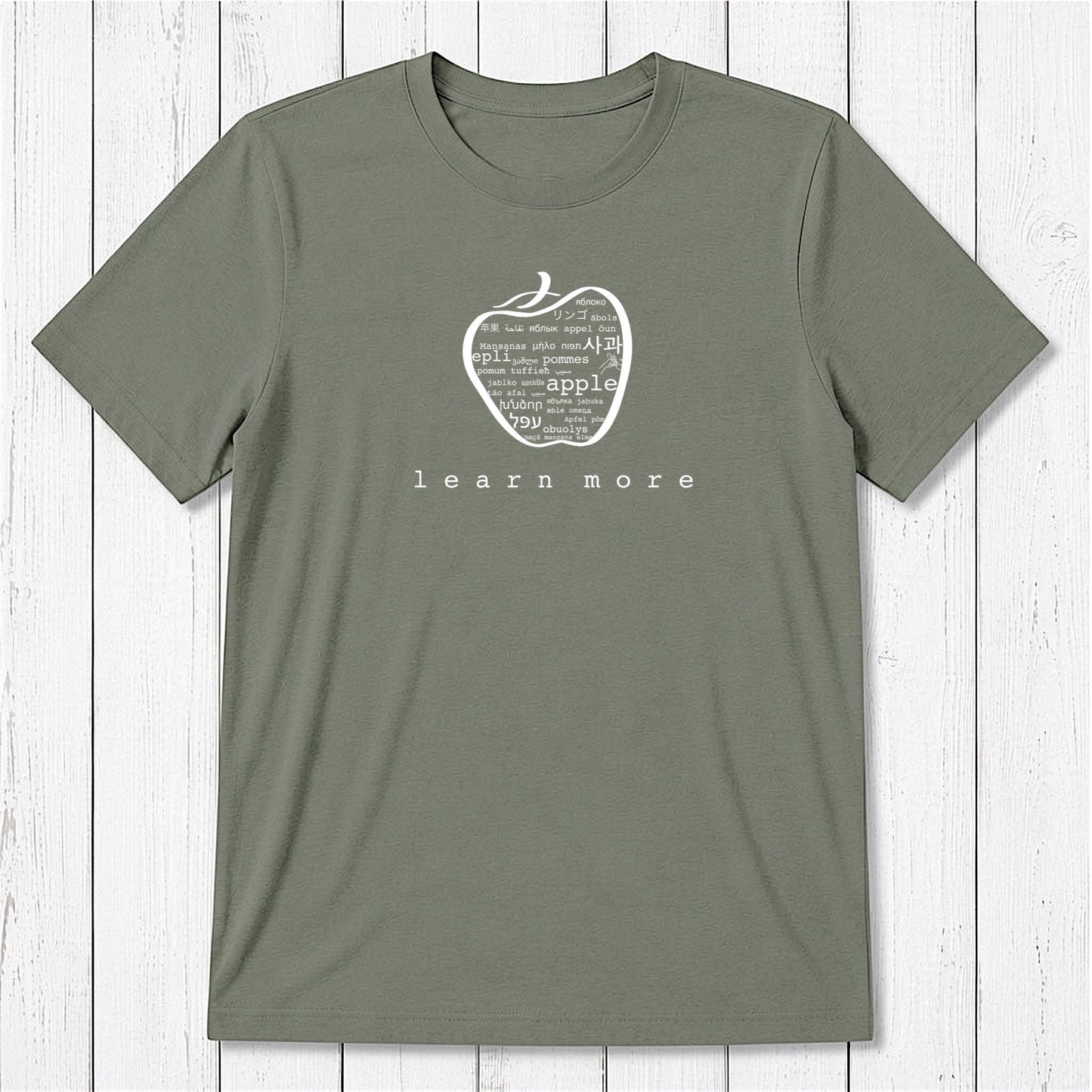 Olive green Men's Teacher T-Shirt in Bamboo & Organic Cotton featuring white apple graphic and 'learn more' message for educators.
