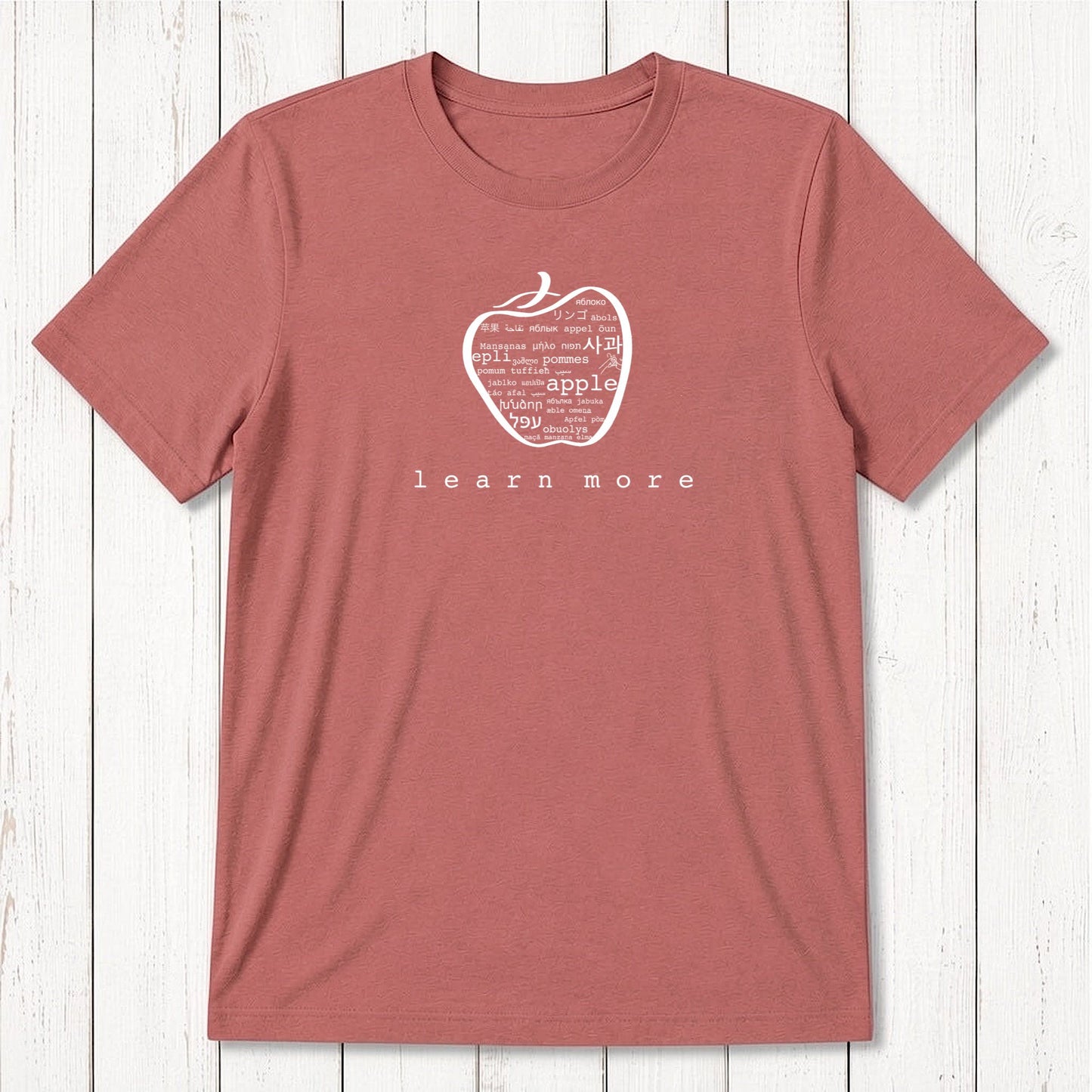 Brick red Men's Teacher T-Shirt in Bamboo & Organic Cotton with white apple graphic and 'learn more' text, ideal for professors.
