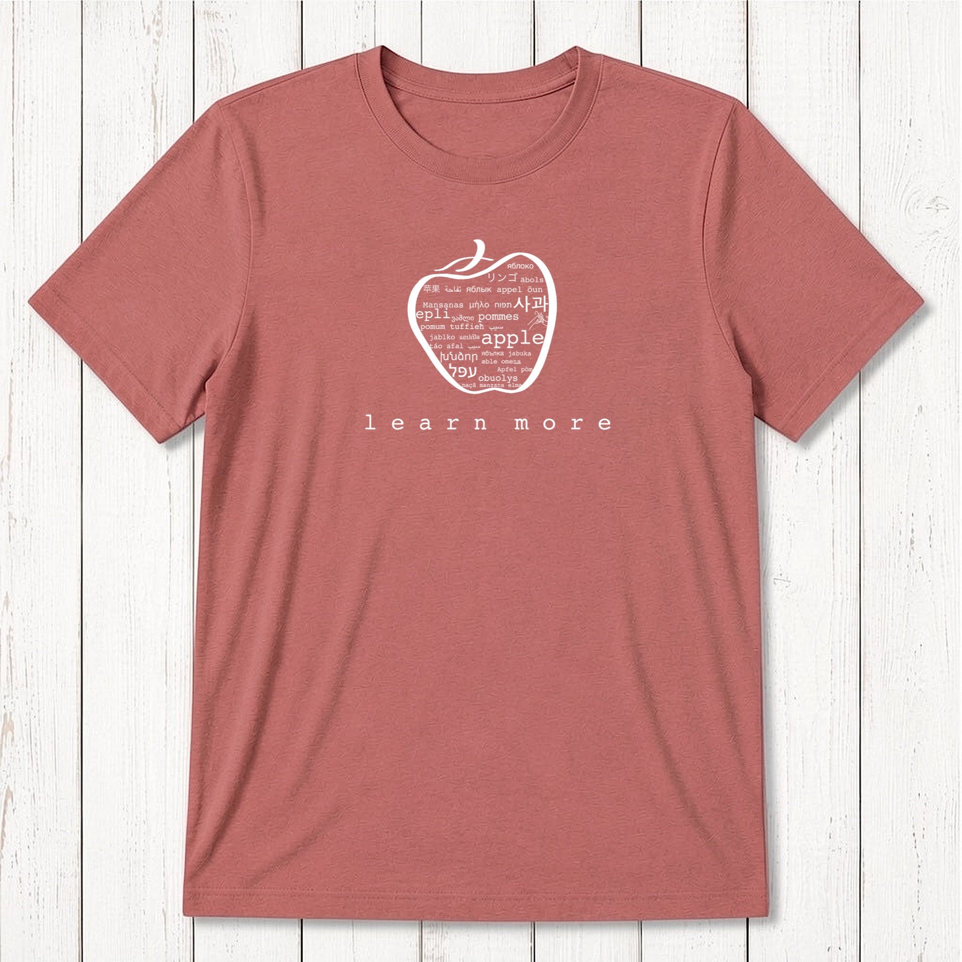 Brick red Men's Teacher T-Shirt in Bamboo & Organic Cotton with white apple graphic and 'learn more' text, ideal for professors.