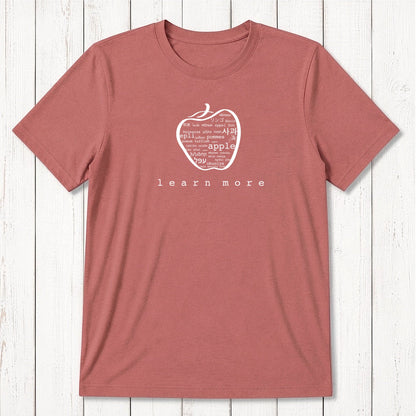Brick red Men's Teacher T-Shirt in Bamboo & Organic Cotton with white apple graphic and 'learn more' text, ideal for professors.