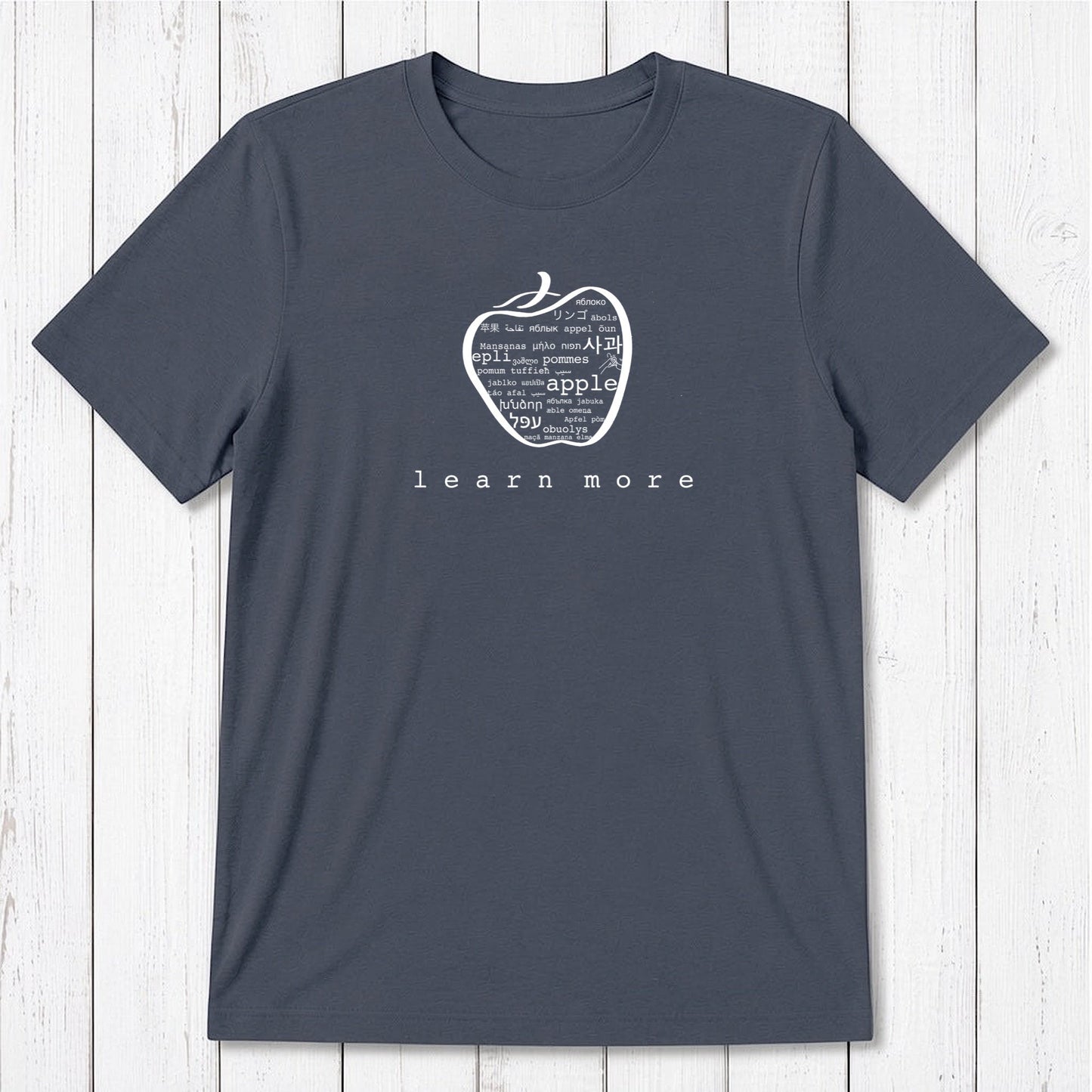 Charcoal grey Men's Teacher T-Shirt in Bamboo & Organic Cotton with white apple graphic and 'learn more' text, classic educator gift.
