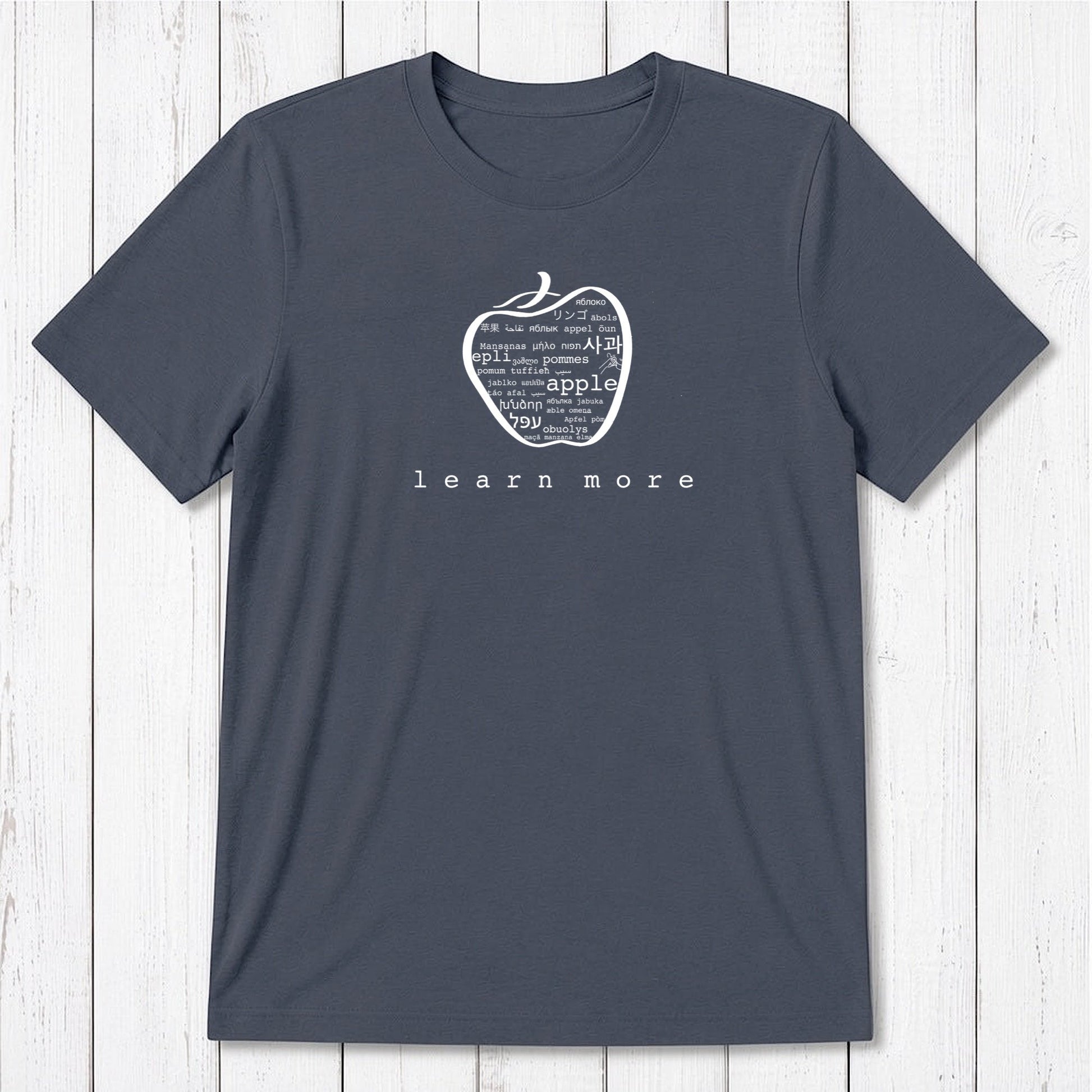 Charcoal grey Men's Teacher T-Shirt in Bamboo & Organic Cotton with white apple graphic and 'learn more' text, classic educator gift.