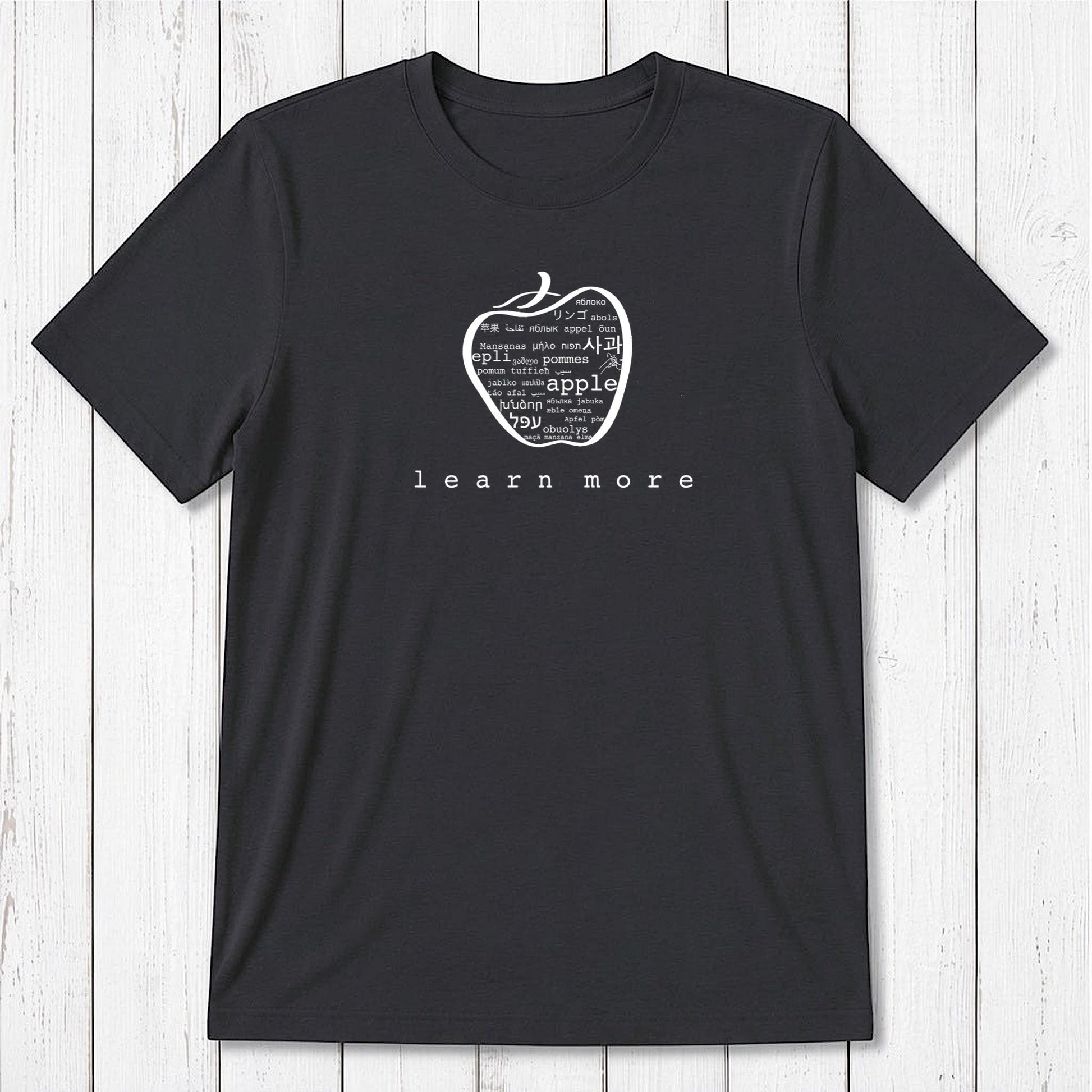 Black Men's Bamboo & Organic Cotton Graphic T-Shirt with tan apple design and 'learn more' message, perfect gift for teachers.