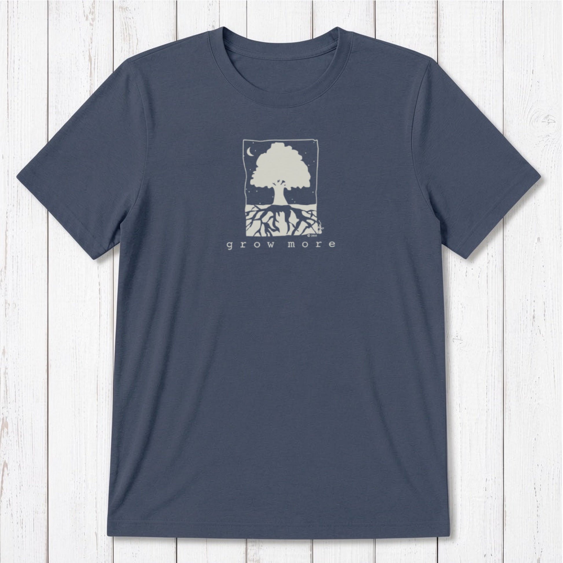 Classic fit navy blue men's bamboo and organic cotton t-shirt with white tree and root 'Grow More' gardening graphic.