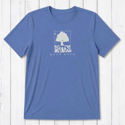 Sky blue men's 'Grow More' tree graphic t-shirt in bamboo and organic cotton, laid flat on rustic wood background.