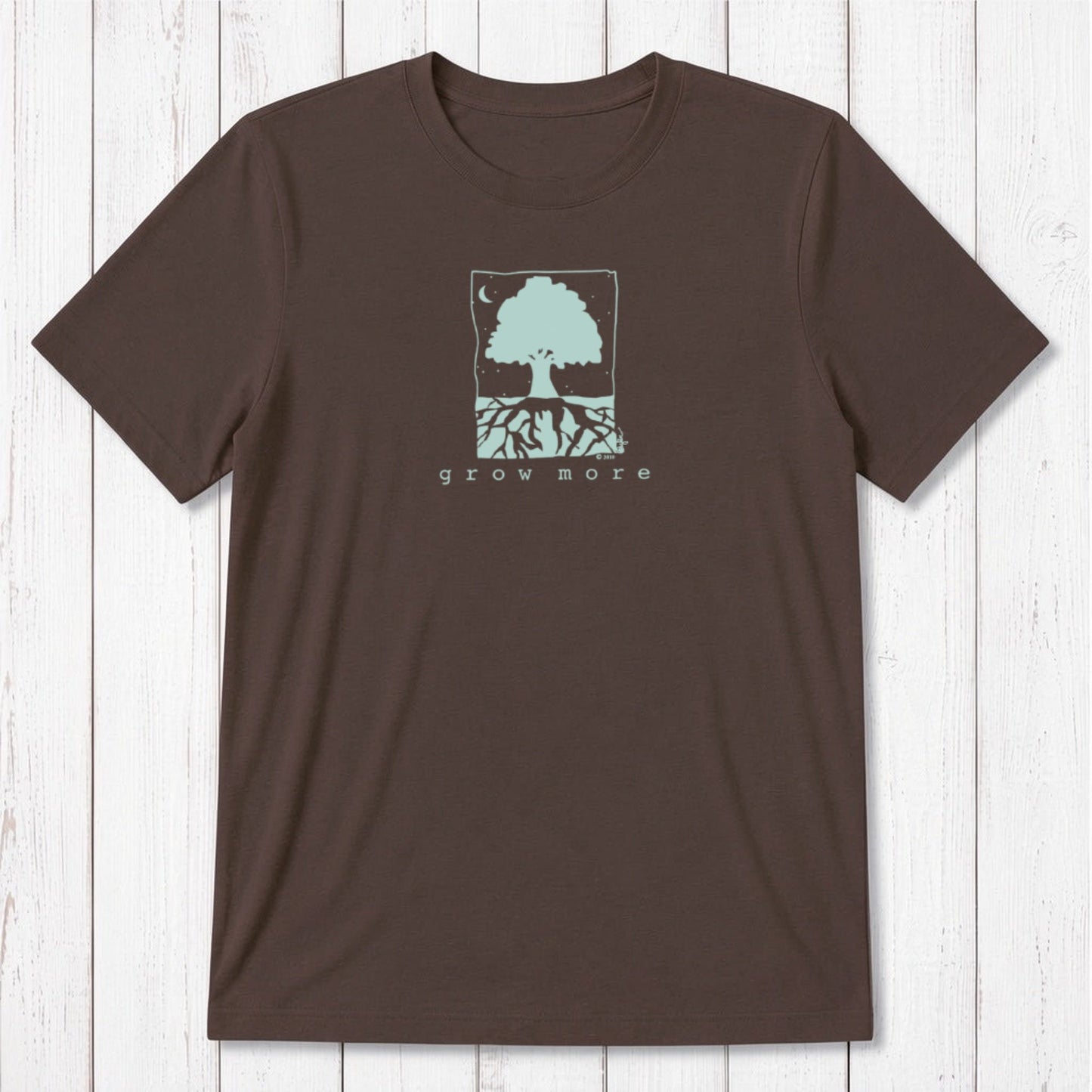 Dark chocolate brown men's bamboo and organic cotton t-shirt with mint green 'Grow More' tree and root graphic.