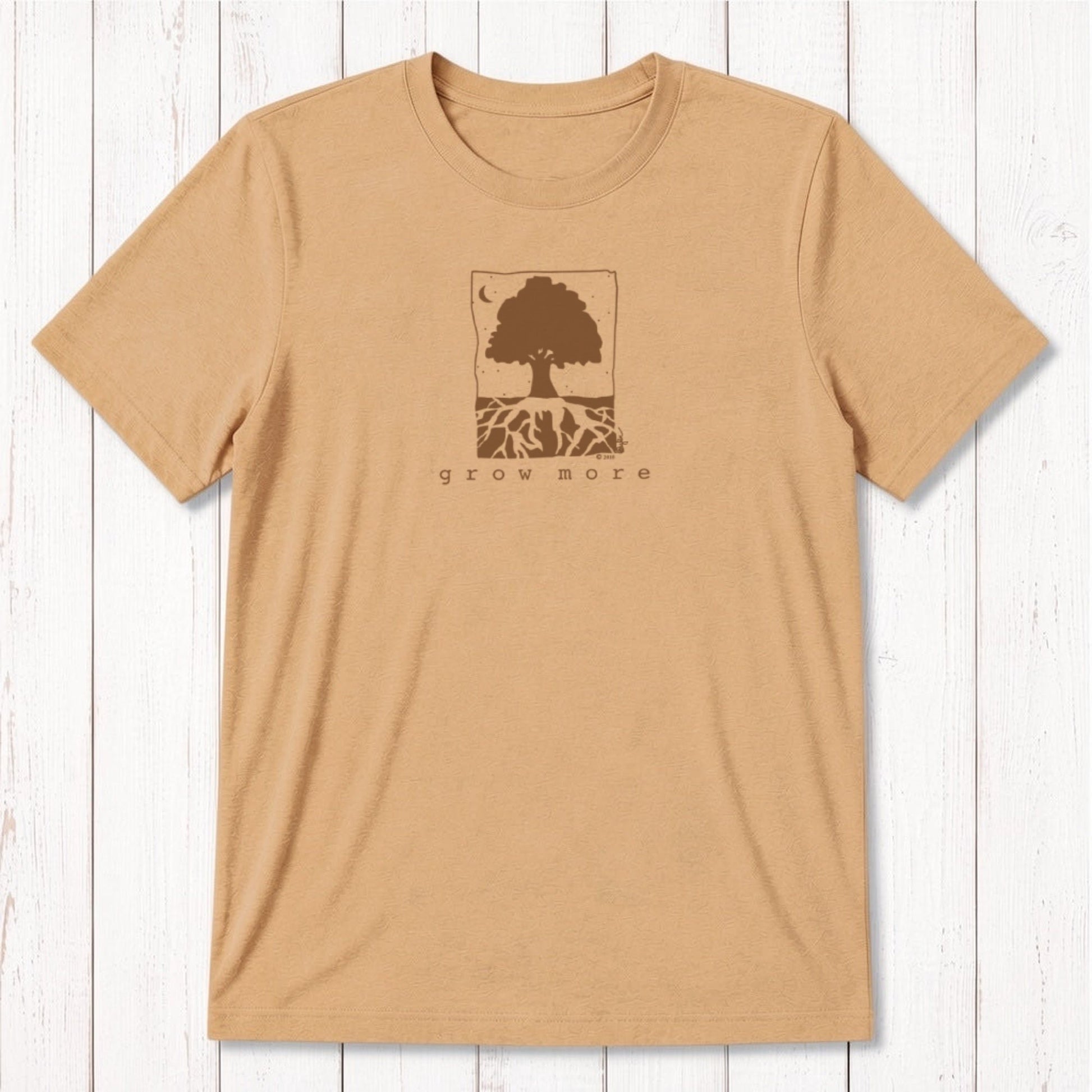 Golden tan men's bamboo and organic cotton t-shirt with green 'Grow More' tree and root gardening graphic.