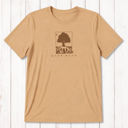 Golden tan men's bamboo and organic cotton t-shirt with green 'Grow More' tree and root gardening graphic.