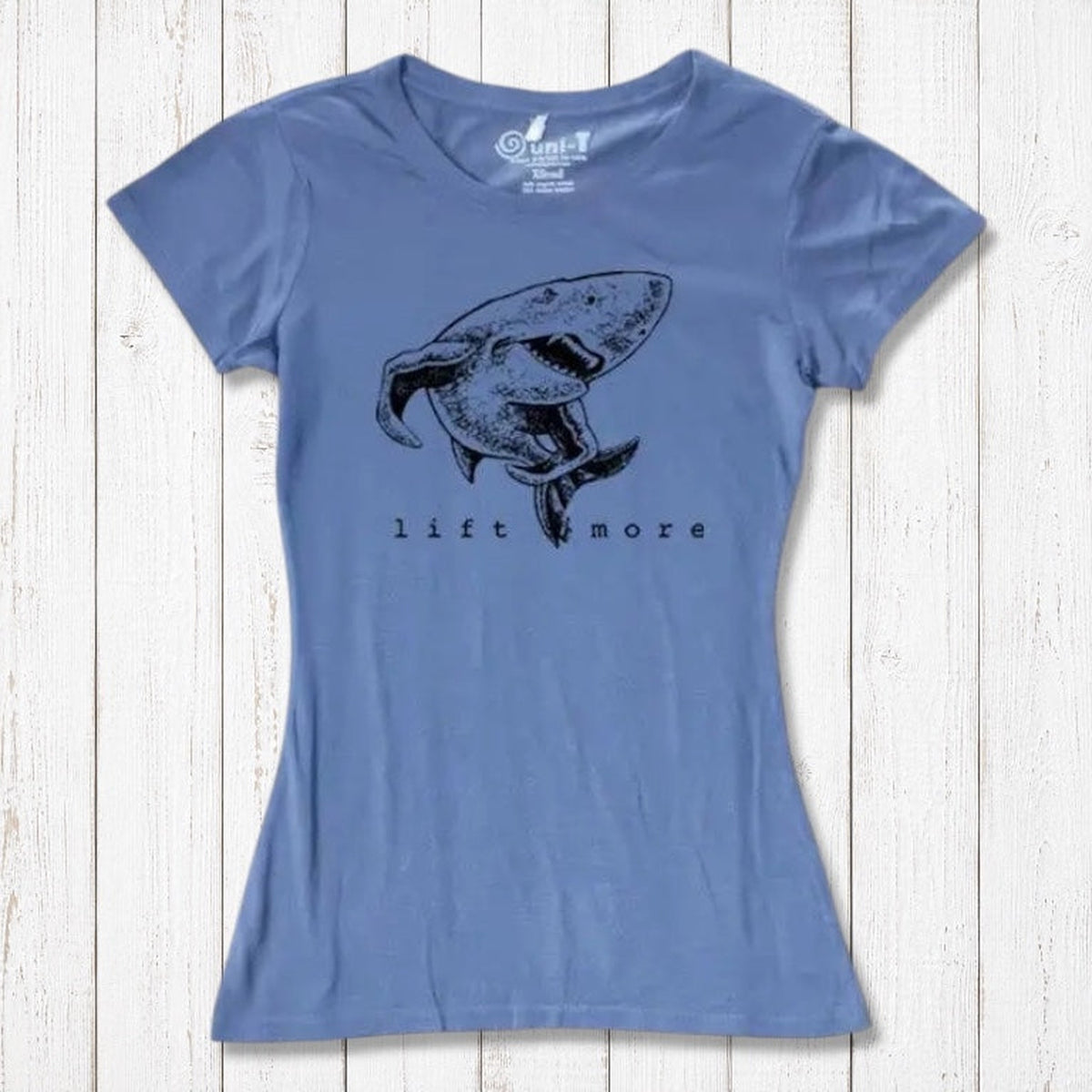 Blue women's fitness T-shirt made from bamboo and organic cotton with shark 'Lift More' print. Ideal gym motivation apparel.