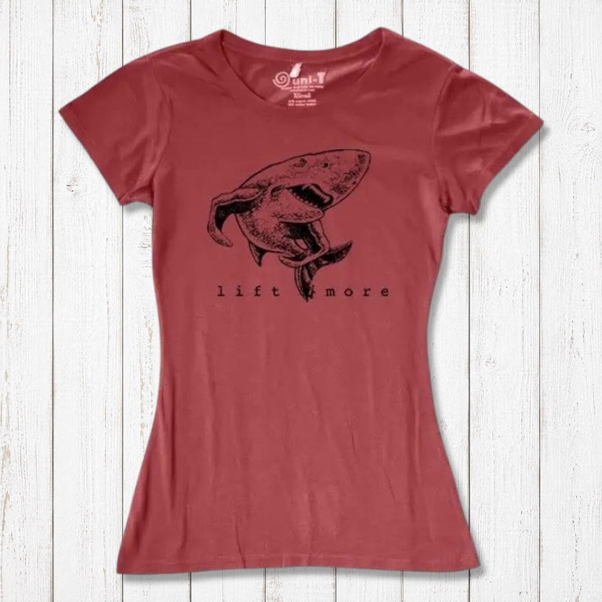 Brick red women's bamboo and organic cotton T-shirt with shark 'Lift More' print. Ideal motivational gift for fitness enthusiasts.