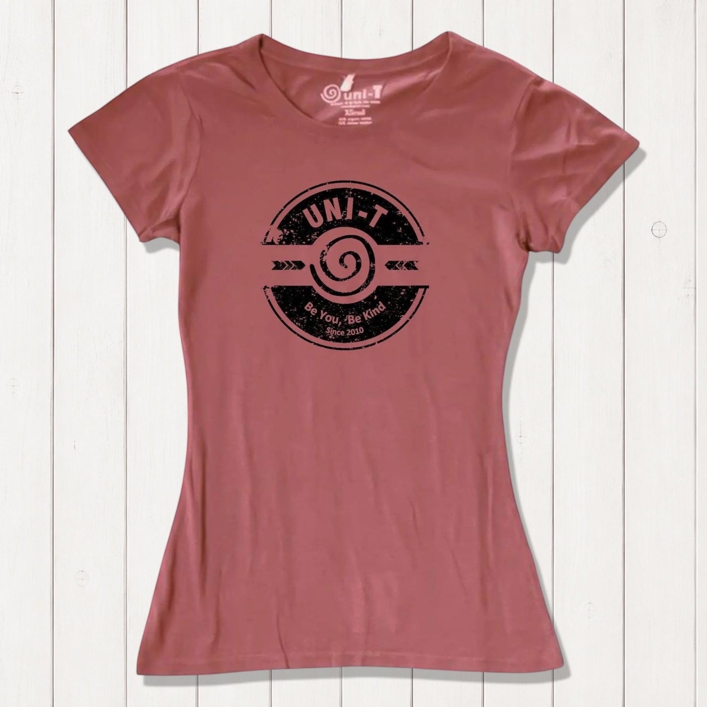 Rust red women's bamboo & organic cotton tee with Uni-T's 'Be You Be Kind' graphic. A sustainable and stylish inspirational gift.