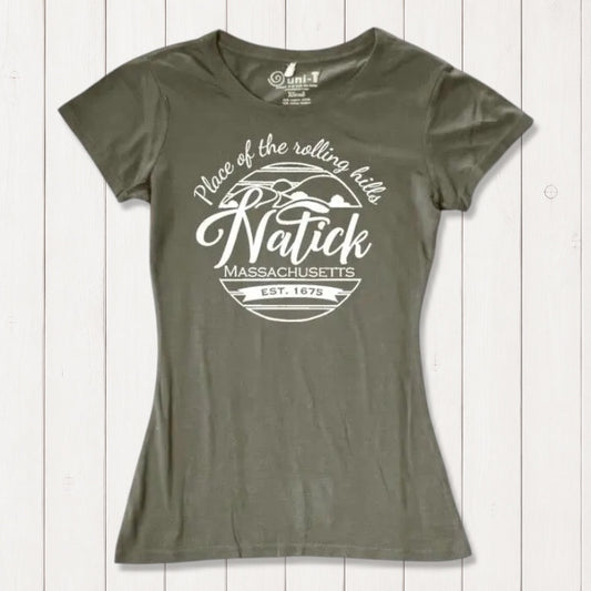 Olive green women's Natick T-Shirt made from bamboo and organic cotton, featuring 'Place of the Rolling Hills' hometown pride graphic. Sustainable Massachusetts apparel.