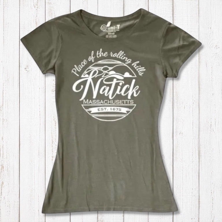 Olive green women's Natick T-Shirt made from bamboo and organic cotton, featuring 'Place of the Rolling Hills' hometown pride graphic. Sustainable Massachusetts apparel.