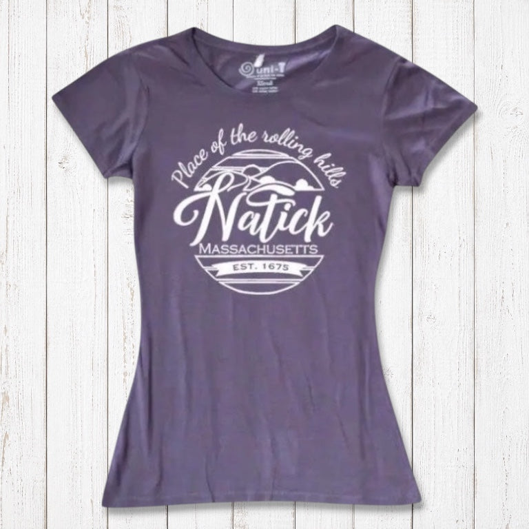 Purple women's Natick T-Shirt in bamboo and organic cotton blend with 'Place of the Rolling Hills' Massachusetts graphic. Eco-friendly local pride clothing.