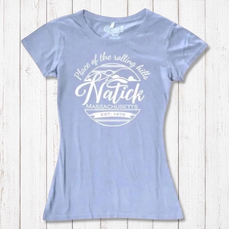 Light blue bamboo and organic cotton Natick T-Shirt for women with 'Place of the Rolling Hills' Massachusetts design. Sustainable and soft local townie tee.