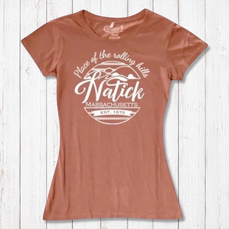 Rust-colored women's Natick T-Shirt made from bamboo and organic cotton with 'Place of the Rolling Hills' Massachusetts graphic. Eco-conscious hometown apparel.