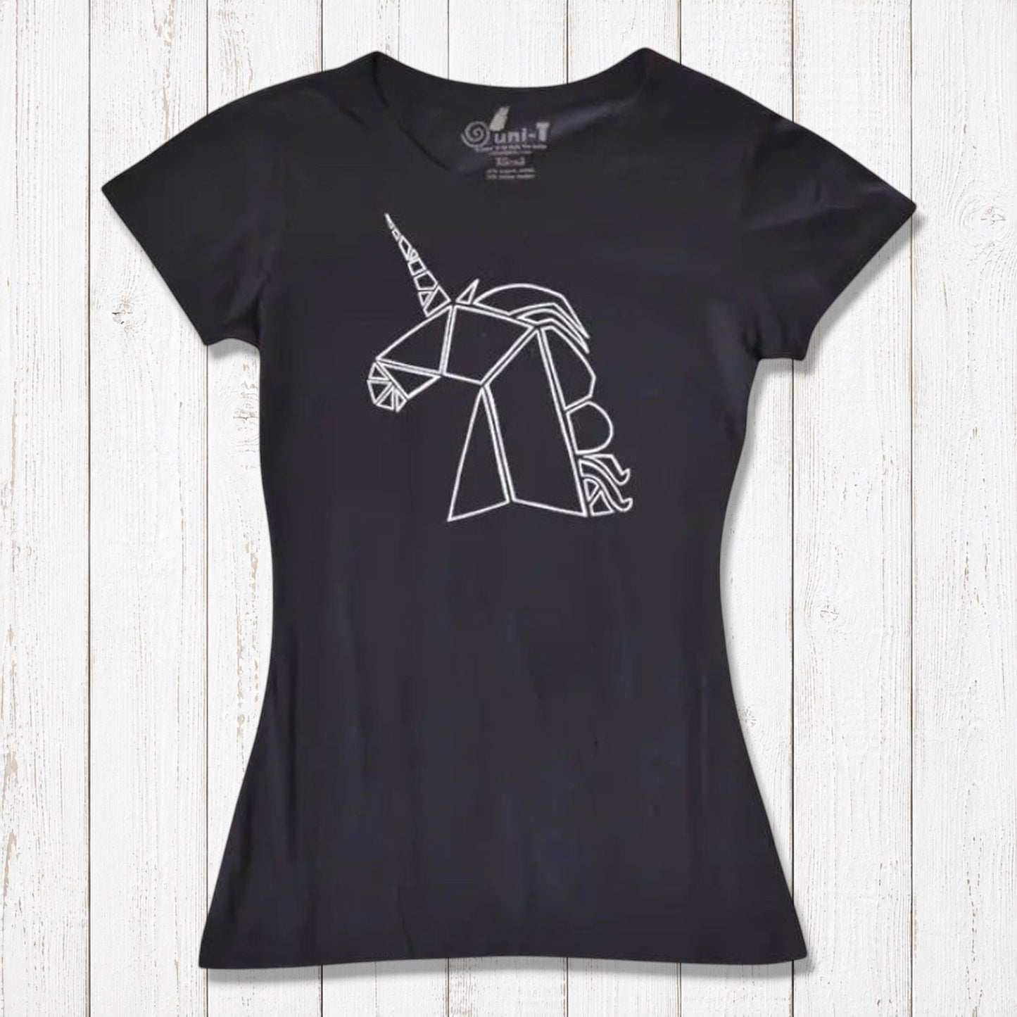 Black Women’s Unicorn T-Shirt made from bamboo and organic cotton, showcasing a white geometric unicorn. Sustainable and magical gift idea.