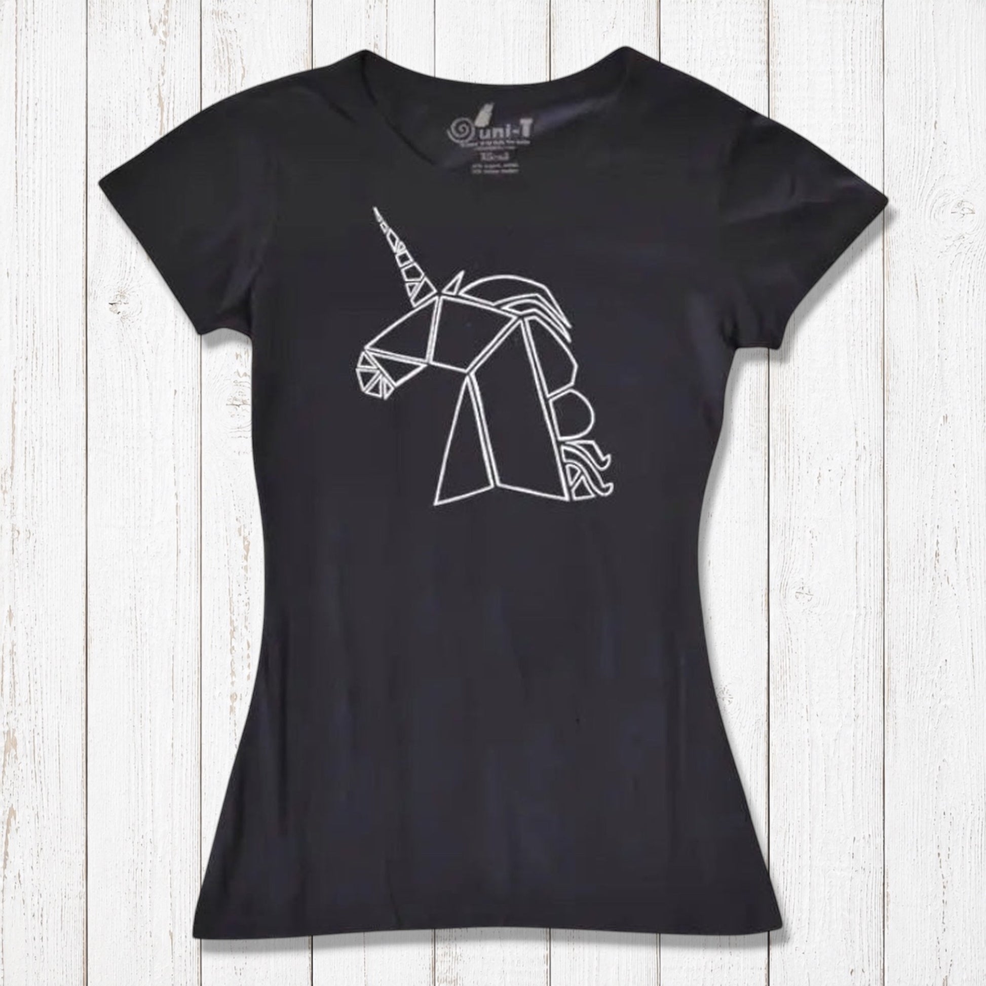 Black Women’s Unicorn T-Shirt made from bamboo and organic cotton, showcasing a white geometric unicorn. Sustainable and magical gift idea.