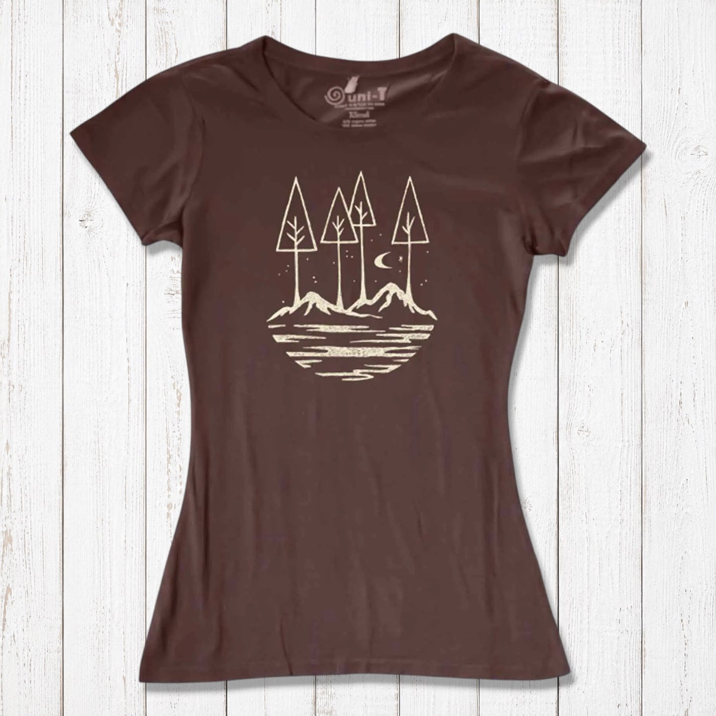 Brown eco-friendly women's graphic tee with minimalist forest and mountain design. Sustainable fashion for nature lovers and hikers.