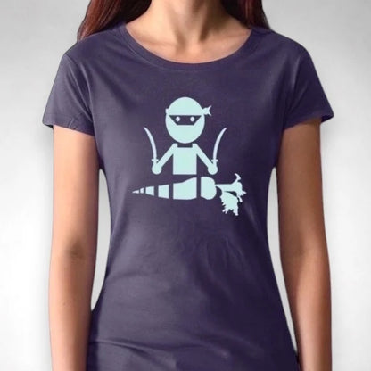 Model wearing navy 'Veggie Ninja' vegan T-shirt for women, featuring a mint green ninja and carrot graphic on sustainable fabric.
