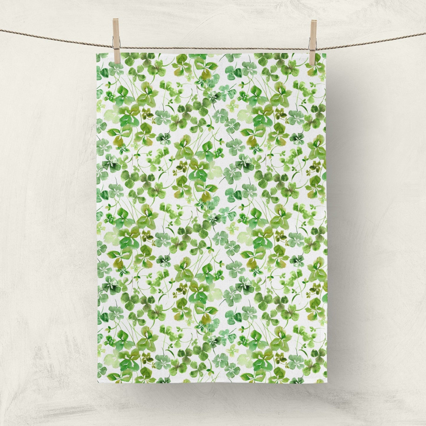Watercolor shamrock kitchen towel with green clover pattern