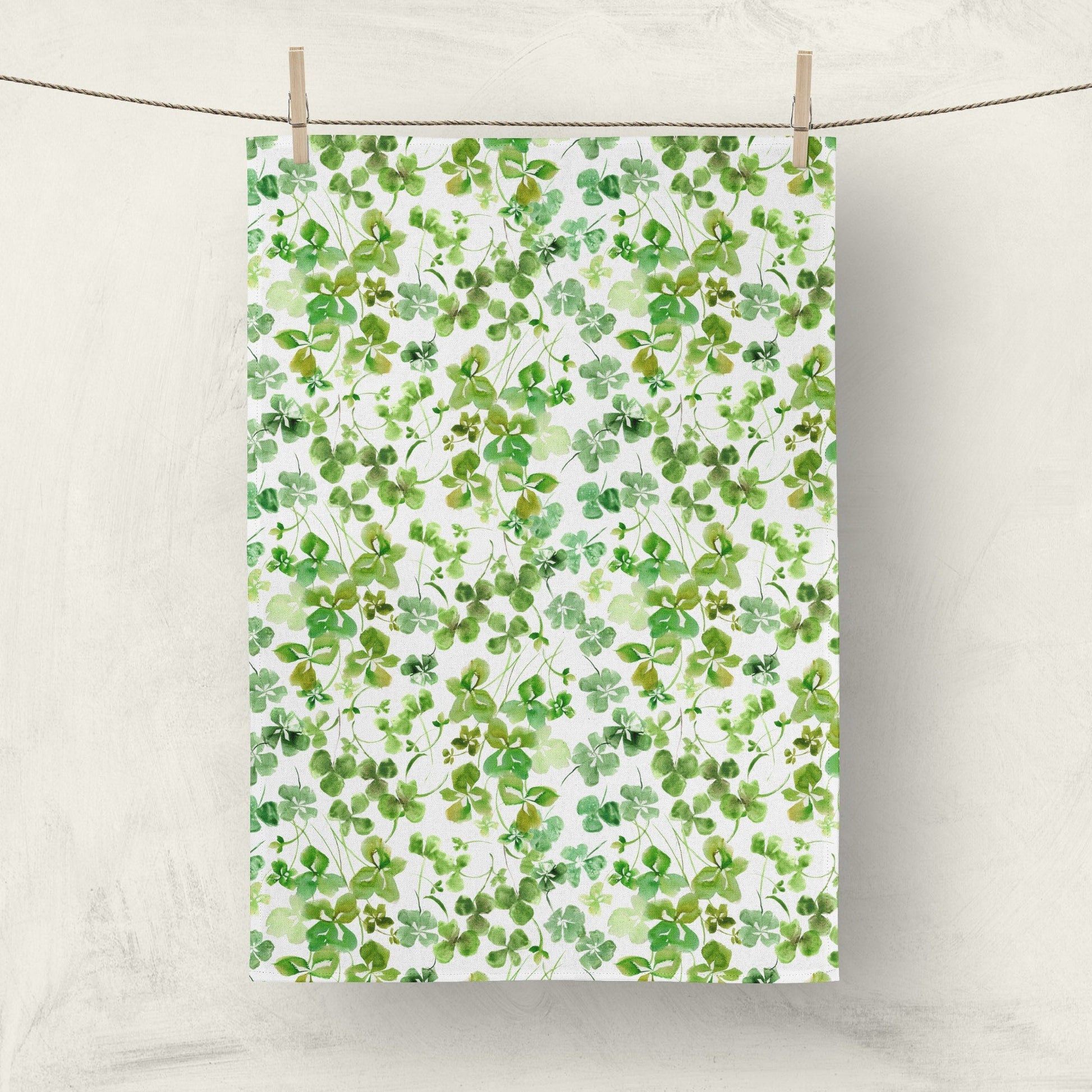 Watercolor shamrock kitchen towel with green clover pattern
