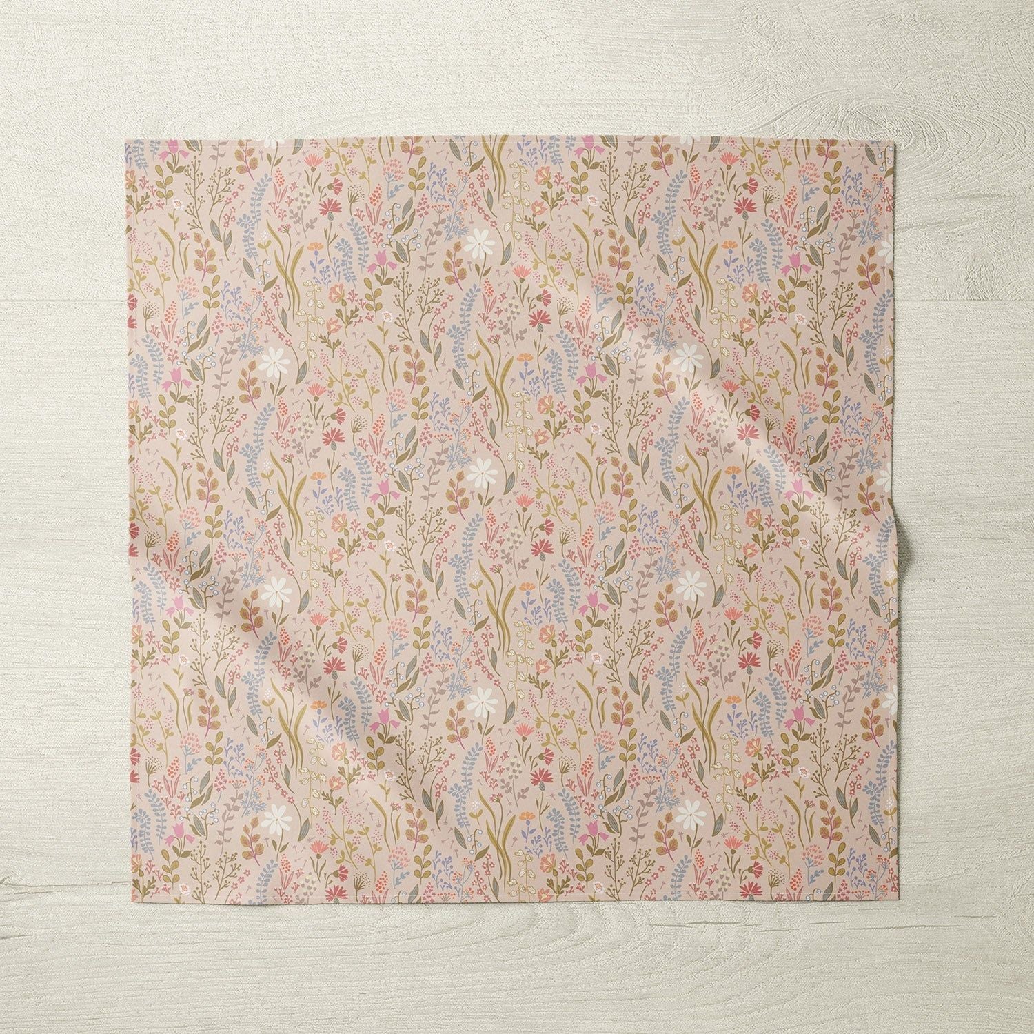 Pink floral patterned tablecloth with matching napkin