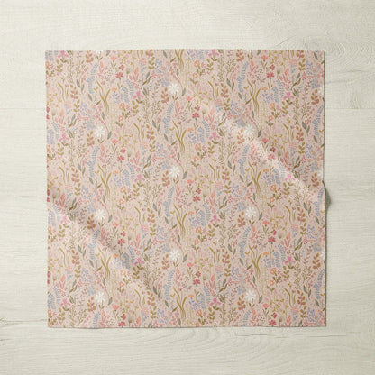 Pink floral patterned tablecloth with matching napkin