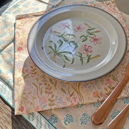 Decorative floral dinner plate with pink and green accents