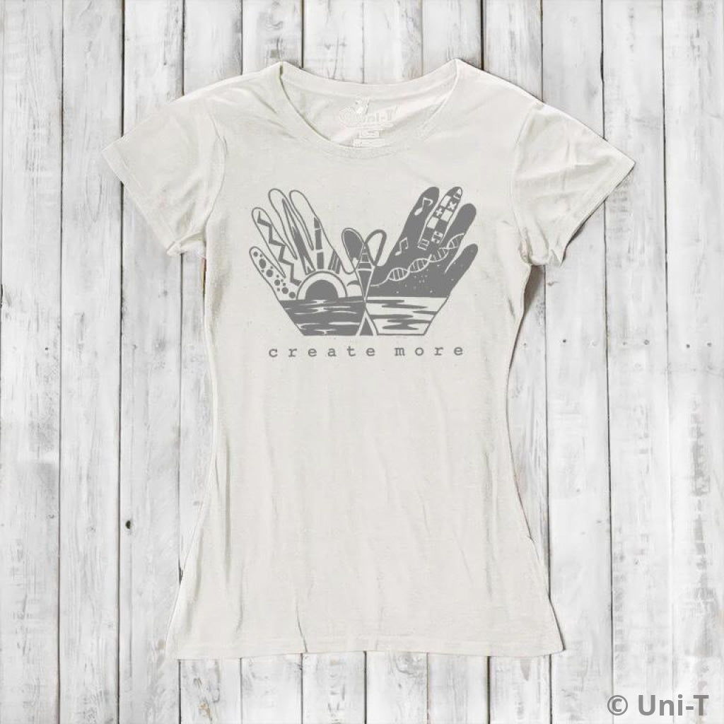 Ivory white Women's Bamboo & Organic Cotton Tee with 'Create More' artistic hands graphic. Ethical fashion top for artists and creatives.
