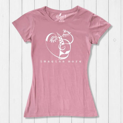Pink Women's Cubism Face T-Shirt in bamboo & organic cotton with white abstract face and 'imagine more' text. Soft, sustainable gift for artists.