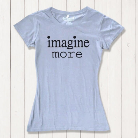 Women's Imagine T-Shirt in Bamboo & Organic Cotton in light blue featuring black 'imagine more' text. Inspirational sustainable tee for artists.