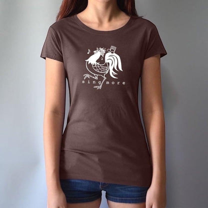 Woman wearing brown 'Sing More' rooster t-shirt made from bamboo and organic cotton, a fun and sustainable gift for music enthusiasts.