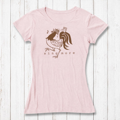 Light pink women's T-shirt made of bamboo and organic cotton with a playful rooster graphic singing with musical notes, casual wear
