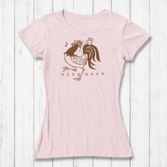 Light pink women's T-shirt made of bamboo and organic cotton with a playful rooster graphic singing with musical notes, casual wear