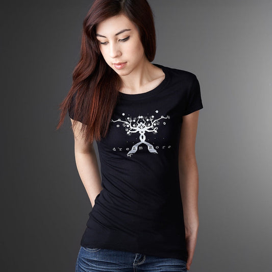 Women's Motivational T-Shirt in Bamboo & Organic Cotton featuring 'Dream More' quote and tree graphic, worn by model in black color.