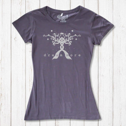 Charcoal gray Women's Motivational T-Shirt in Bamboo & Organic Cotton with light 'Dream More' tree graphic, flat lay on wood background.