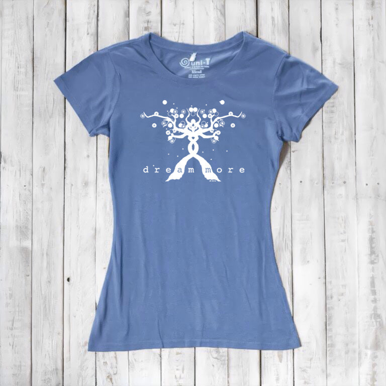 Blue Women's Motivational T-Shirt in Bamboo & Organic Cotton with white 'Dream More' tree design, flat lay for inspirational apparel.