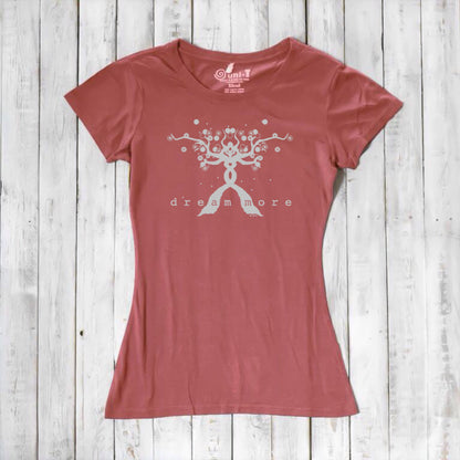 Terracotta Women's Motivational T-Shirt in Bamboo & Organic Cotton with light 'Dream More' tree design, flat lay on wood background.