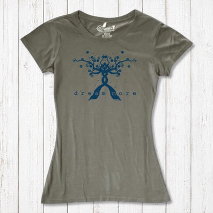 Olive green Women's Motivational T-Shirt in Bamboo & Organic Cotton with blue 'Dream More' tree graphic, flat lay on rustic wood.