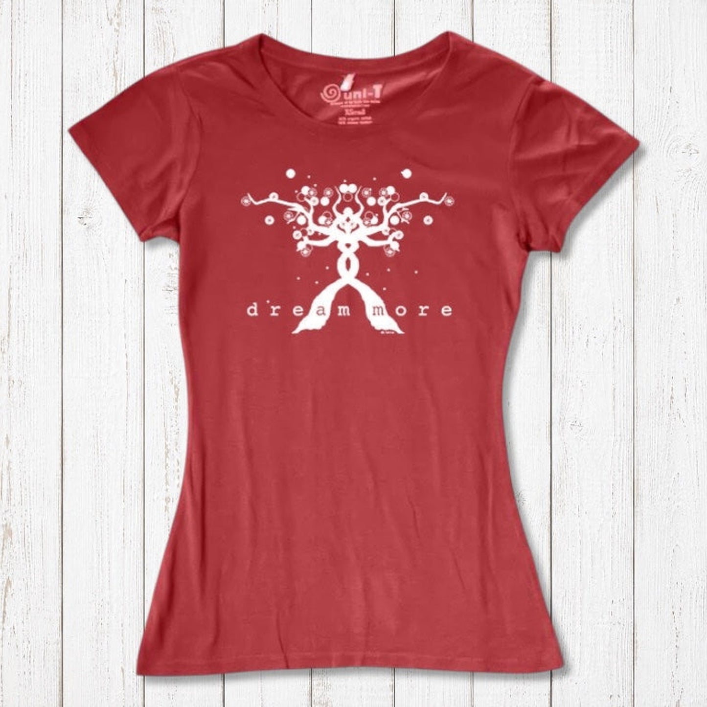 Red Women's Motivational T-Shirt in Bamboo & Organic Cotton with bold white 'Dream More' tree design, laid flat for product showcase.