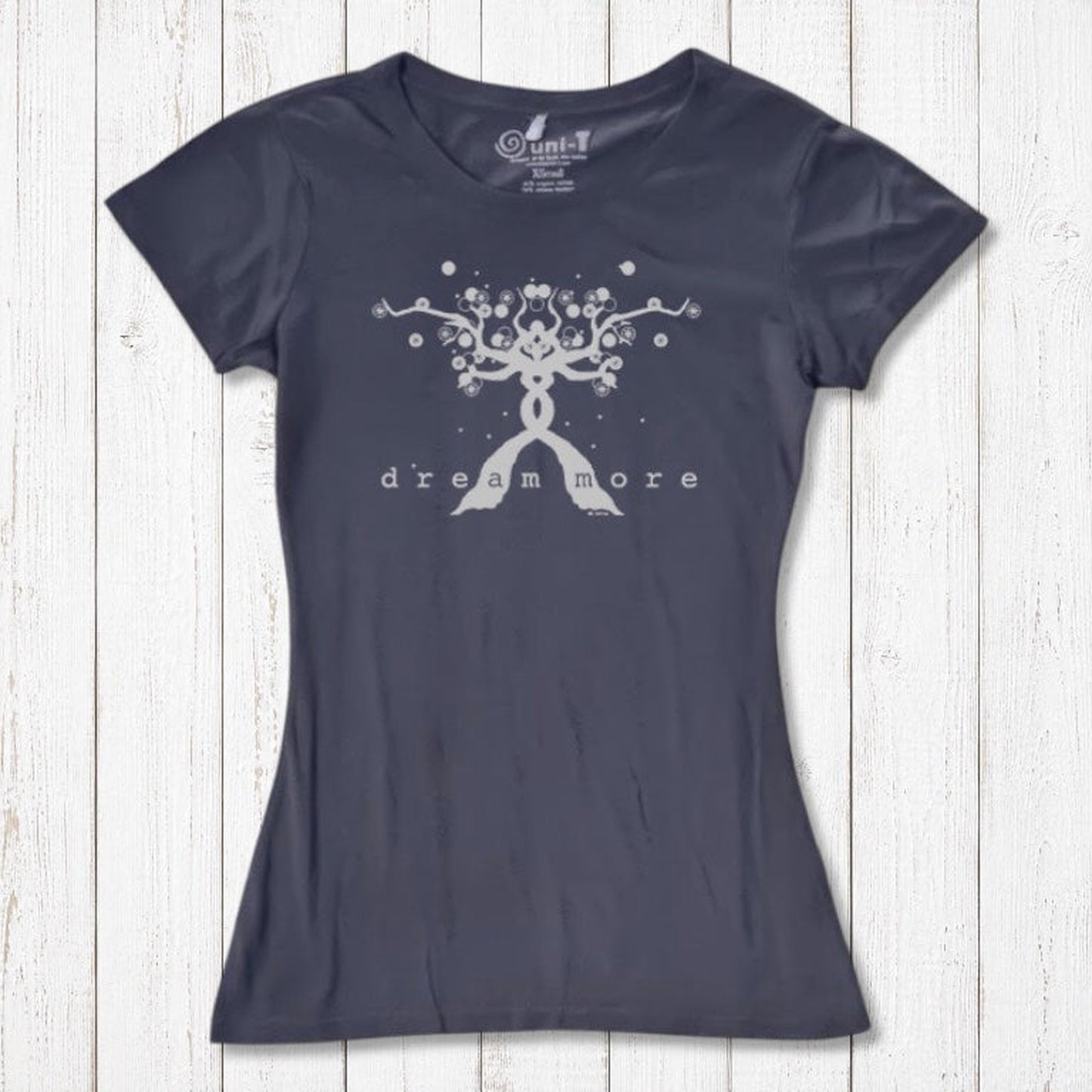 Navy Women's Motivational T-Shirt in Bamboo & Organic Cotton with light 'Dream More' tree design, laid flat for inspirational fashion.