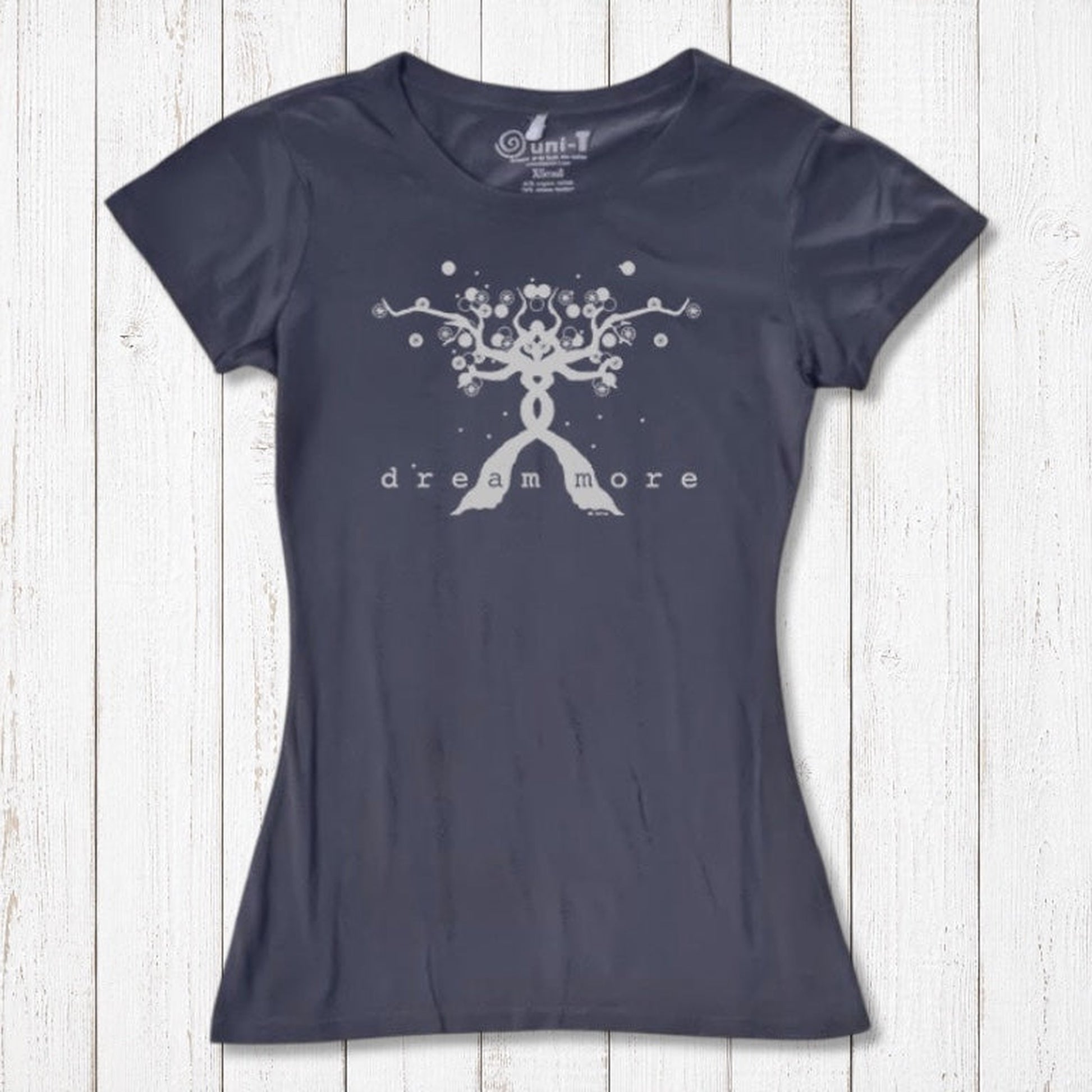 Navy Women's Motivational T-Shirt in Bamboo & Organic Cotton with light 'Dream More' tree design, laid flat for inspirational fashion.