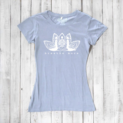 Light blue Women's Yoga T-Shirt in Bamboo & Organic Cotton with 'Breathe More' lotus design, sustainable and inspirational yoga apparel.